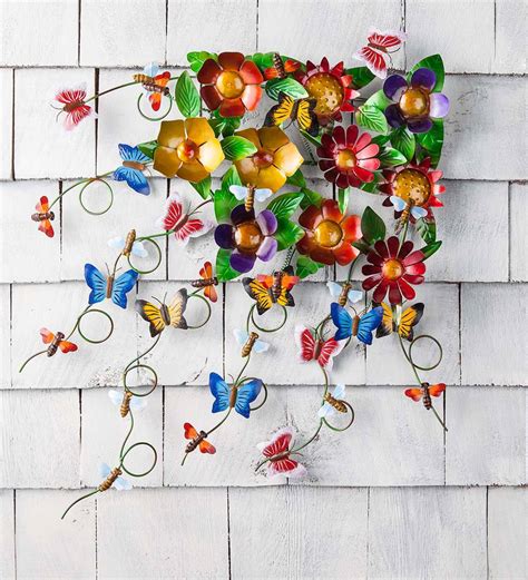 Looking to decorate with metal wall art for your garden? Garden Spray Metal Wall Art with Flowers and Butterflies ...