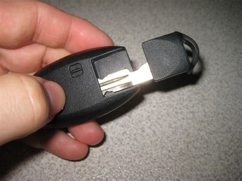 Comes off and the battery is located inside. Nissan-Murano-Intelligent-Key-Fob-Battery-Replacement ...