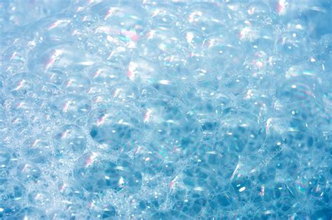 Background Of Blue Foam Bubbles — Stock Photo © Voronin 76 2604471