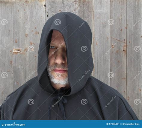 Man Wearing A Black Hooded Cape One Eye Stock Image Image Of