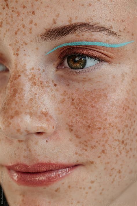 Face Of Young Freckled Woman With Makeup Stocksy United Beautiful