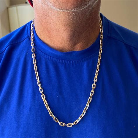 This elegant 14kt gold cross blends together two traditional symbols into one beautiful expression o. Men's Rectangular Link 14 Karat Two-Tone Gold Chain Necklace For Sale at 1stdibs