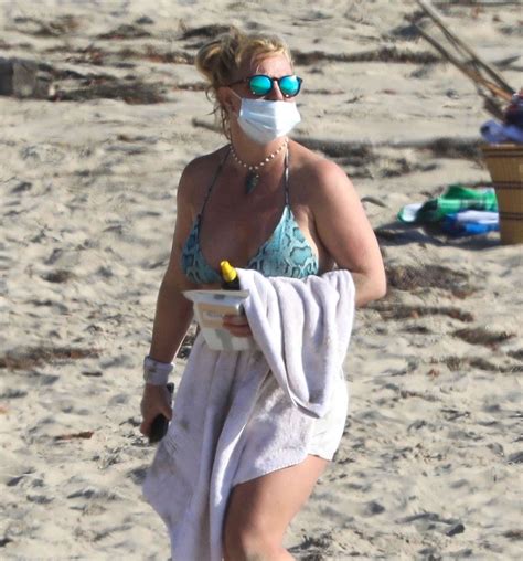 Britney Spears Sunbathing On The Beach In Malibu With Her Security Guard Photos The