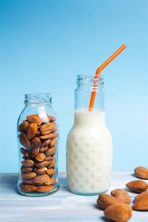 Organic White Almond Milk In A Glass Bottle Stock Photo Image Of