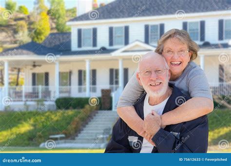 Happy Senior Couple In Front Of House Stock Image Image Of Front Happy 75612633