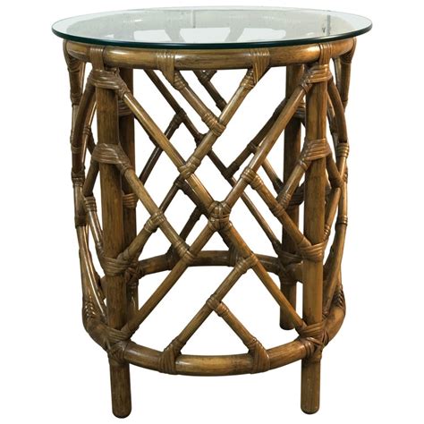 Noir side table combines glass and lovely raw casted shelve in a satin brass antique cast metal frame: 1960s Round Bamboo Glass Top Side Table For Sale at 1stdibs