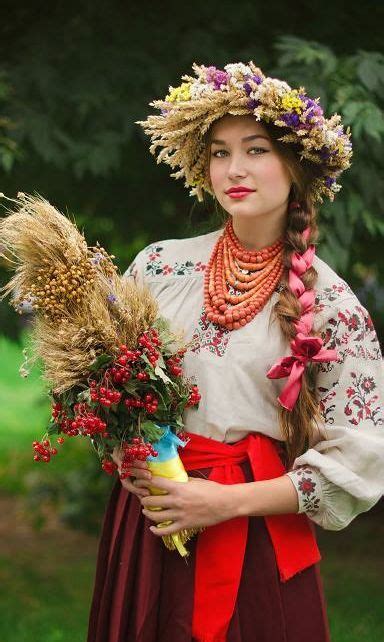 Eastern Europe Portrait Of A Woman Wearing A Traditional Floral