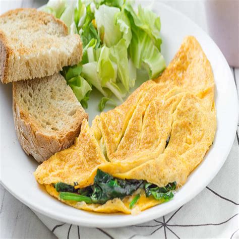 I prefer a fork to a whisk for omelets because i don't want to work air into the eggs: Spinach and Cheese Omelette Recipe: How to Make Spinach and Cheese Omelette
