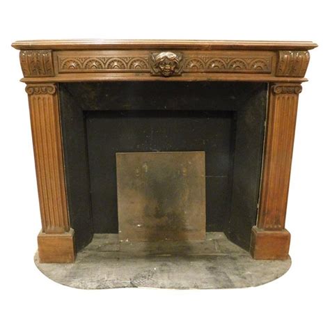 Antique Wooden Fireplace Mantel Carved With Satyr And Columns 19th