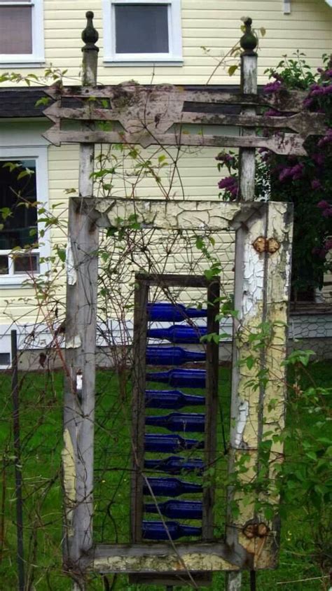 Garden Gate With Blue Wine Bottles Wine Bottle Art Bottle Trees