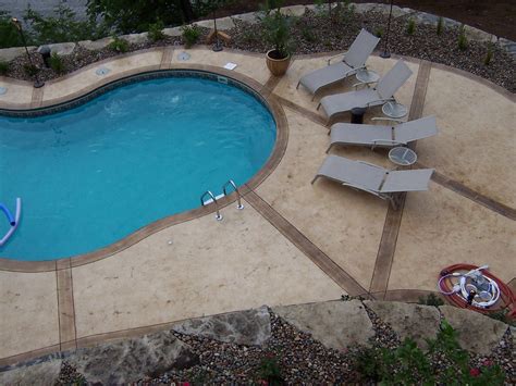 Stamped Concrete Pool Surrounds With Scenic Lake View
