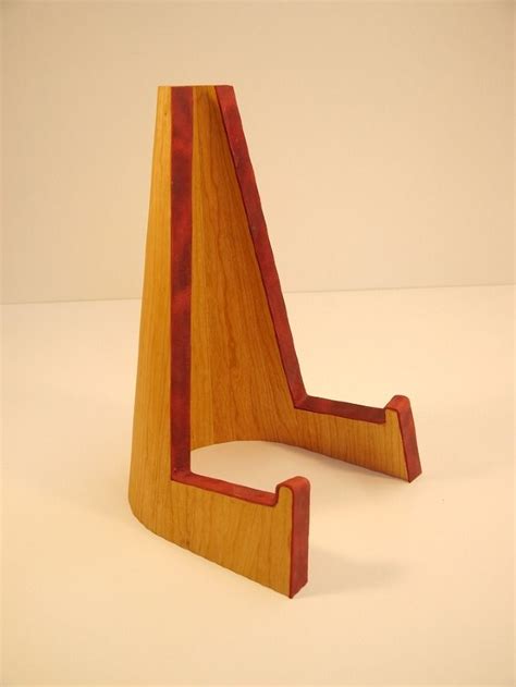 Check spelling or type a new query. cone shaped wooden guitar stand | Wooden guitar stand, Wood guitar stand, Diy guitar stand