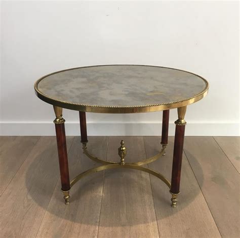 French midcentury double tier lucite and brass coffee table, pierre vandel. Round Coffee Table Made of Rare Red Lucite Legs at 1stDibs