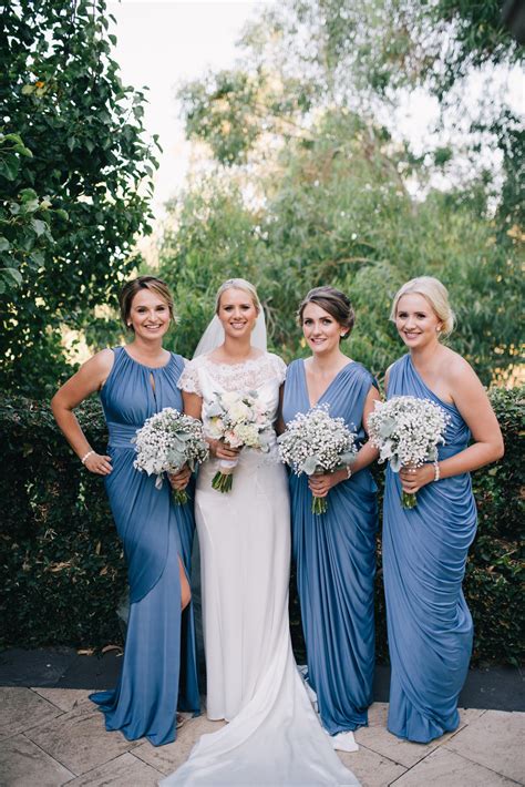 Just perfect for pregnant bridesmaids. Steel Blue Bridesmaid Dresses - White Runway Blog
