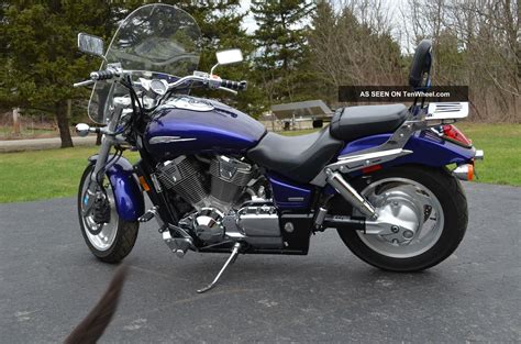 This publication includes the latest production information available before printing. 2003 Honda Vtx 1800 Blue With Accesories