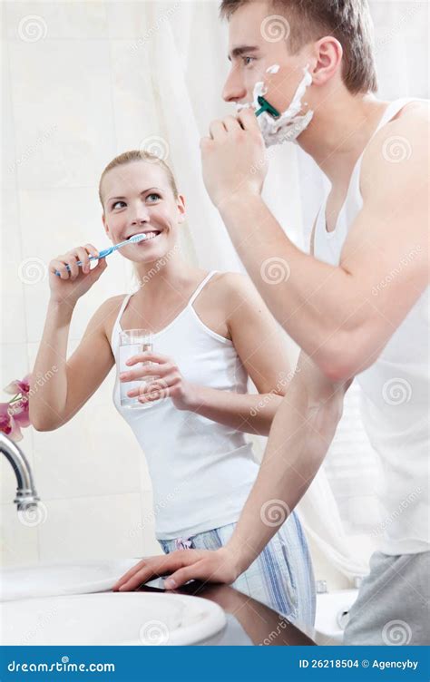 Husband And Wife Are In The Bathroom Stock Images Image 26218504