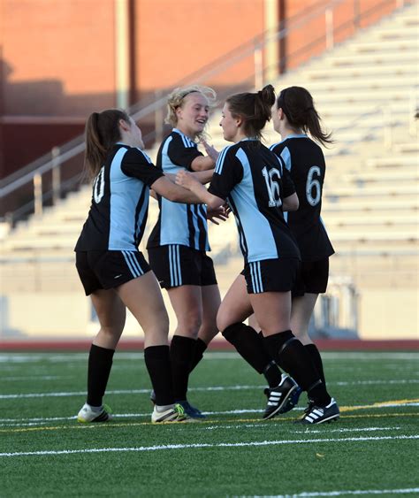 Girls From The Sme Varsity Soccer Team Celebrate After They Score Against South Making The