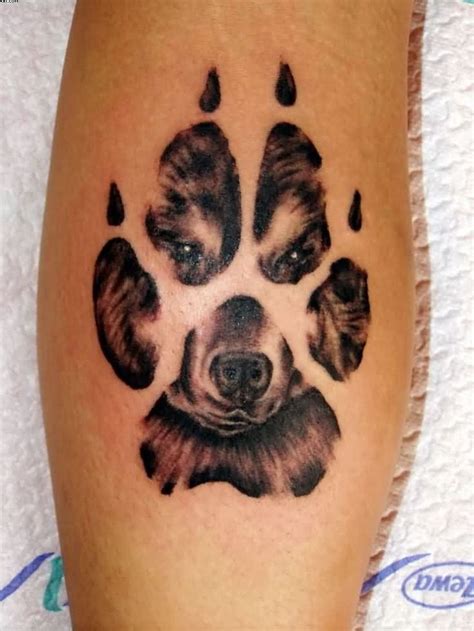 Dog Face In Paw Print Tattoo Design For Leg Pawprint Tattoo Dog Paw
