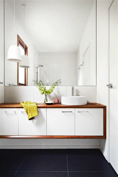 Large bathroom mirrors, like huge mirrors. Big Bathroom Mirror Trend in Real Interiors