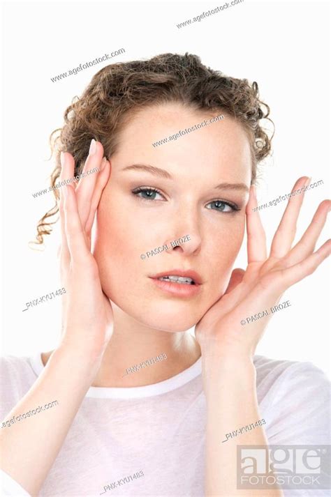 Portrait Of A Woman Rubbing Temples Stock Photo Picture And Royalty