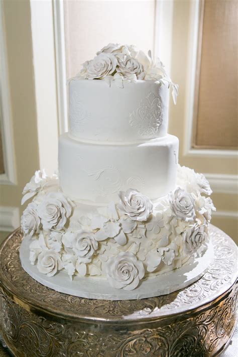 Tiered Wedding Cake With Ivory Buttercream And Sugar Flowers