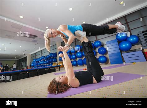 Coach And Her Gymnasts In The Fitness Stock Photo Alamy
