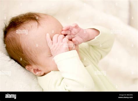 Tired Baby Girl Rubbing Her Eyes Stock Photo Alamy