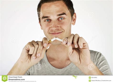 Man Breaking A Cigarette Quit Smoking Stock Photo Image Of White