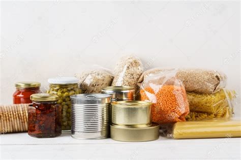 Premium Photo Various Canned Food And Raw Cereal Grains On A Table