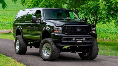 Lifted Diesel Ford Excursion Rolls Over The Competition Ford Trucks
