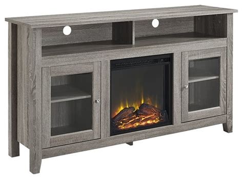 This fireplace entertainment center provides numerous features for instance a full function remote, realistic fake fire effect, and on screen display. Walker Edison 58" Wood Fireplace TV Stand in Driftwood ...