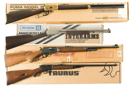 Four Long Guns A Puma Model 92 Lever Action Rifle With Box B Rossi