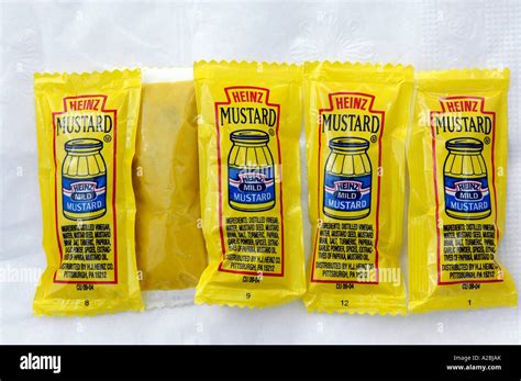 Individual Packets Of H J Heinz Mustard Stock Photo Alamy