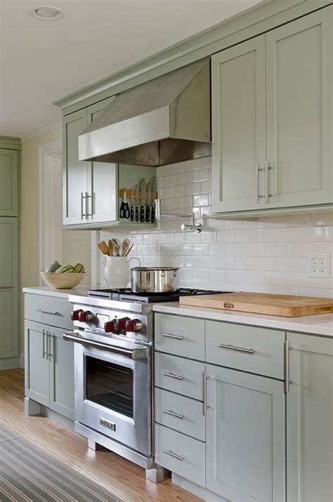 From the latest appliances to completing your project with a stunning range of lighting, flooring choose cabinets, worktops, flooring, splashbacks and wall colours from an array of designs and finishes to find what will work for you and your home. Sage Green Cabinets - Transitional - Kitchen