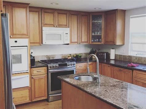 Check out our facebook page: Kitchen Cabinet Painting - Connected Painting