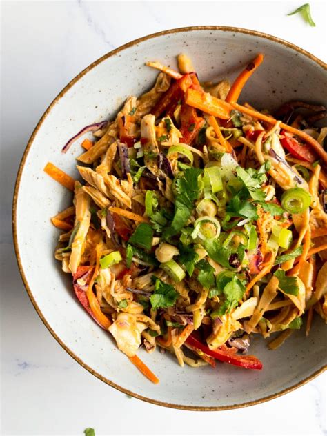 This rainbow chopped thai chicken salad has just about every color of the rainbow. Chopped Thai Chicken Salad with Peanut Dressing | Bites of ...