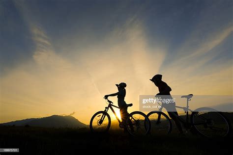 Sunset Bike Ride Stock Photo Getty Images