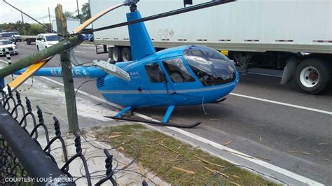 The chopper crashed about 2 a.m. Helicopter crashes onto busy Florida highway, rotor blade ...