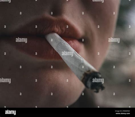 Girl Smoke Cigarette Stock Photo Alamy