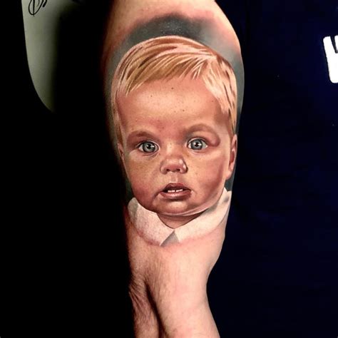 Realistic Baby Portrait Tattoo By Chris Meighan