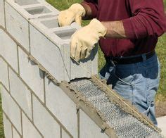 Building a Concrete-block Retaining Wall - Building Masonry Walls