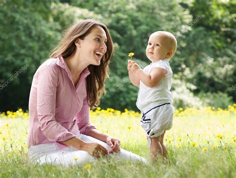 Happy Mother And Child In The Park — Stock Photo © Mimagephotos 28890859