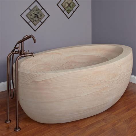 8 Stunning Examples Of Bathtubs Made From Solid Stone