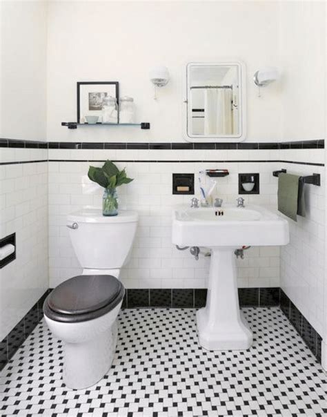 The Bathroom Is Decorated In Black And White