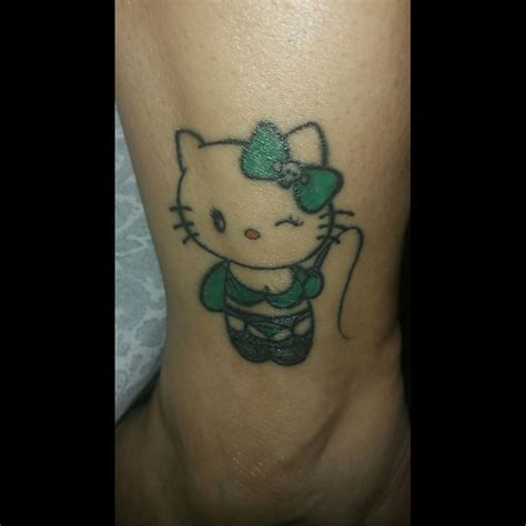 Hello Kitty Bow On Shoulder Tattoos
