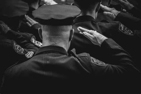 Black And White Photography Of A Police Officer Giving Honor 6000 X