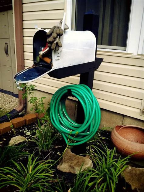 Build A Garden Hose Storage With Planter Diy Projects For Everyone