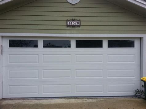 The motifs and signs are usually same with. Amarr long panel garage door with solid windows gives this ...