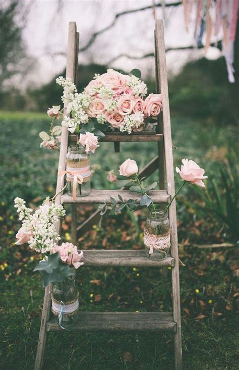 Make your guests feel like they've literally stepped back in time with an antique doorway leading to your outdoor wedding ceremony site. 20 Vintage Rustic Wedding Decoration Ideas with Ladders - EmmaLovesWeddings