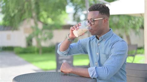 African Man Drinking Coffee Outdoor Stock Image Image Of Busy Refresh 227750147